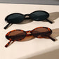Ovale Retro-Sonnenbrille mit Leopardenmuster